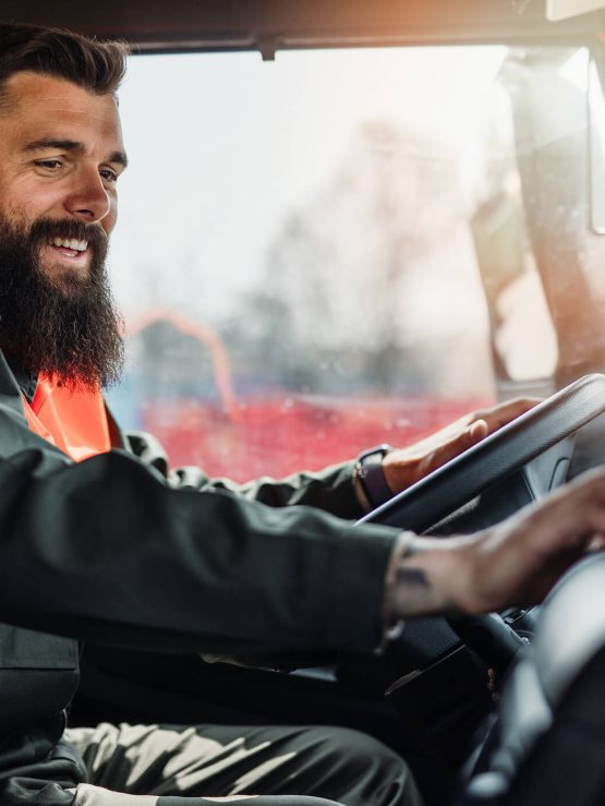 A truck driver in a truck